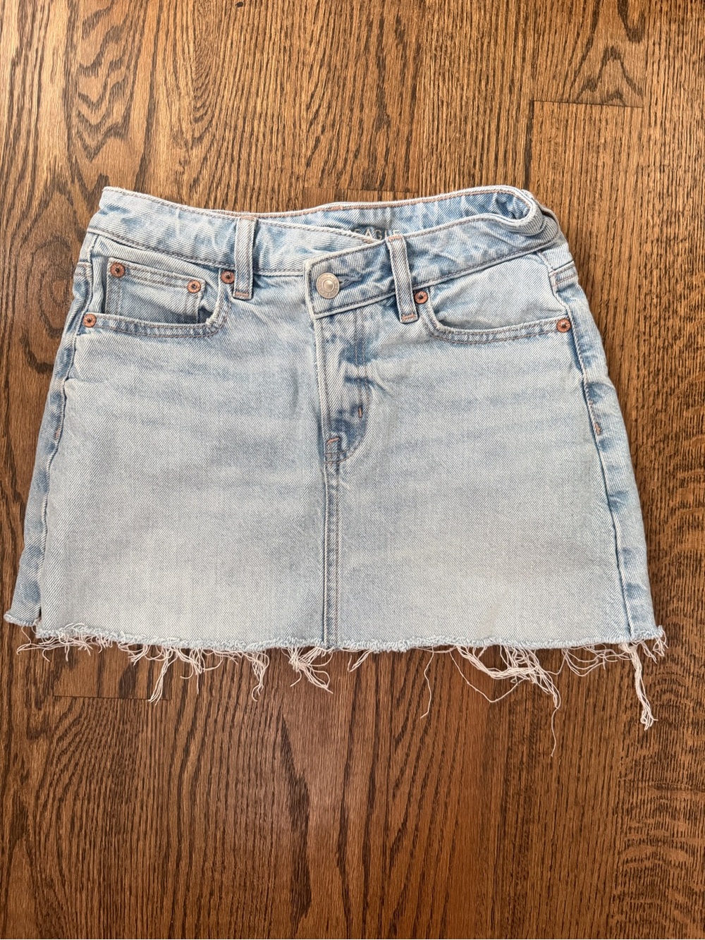 American Eagle Outfitters Light Blue Denim Mini Skirt with Frayed Hem